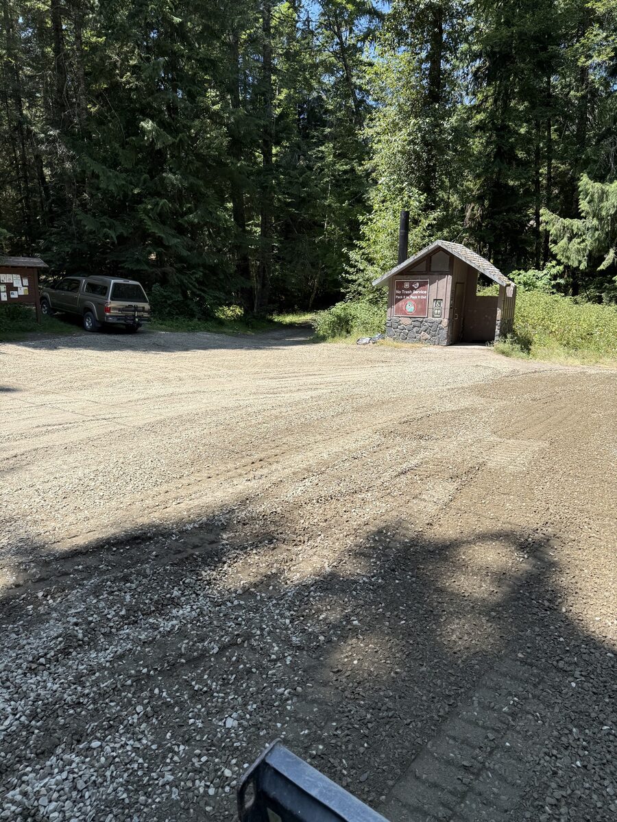 Gravel parking area at a forest recreation site